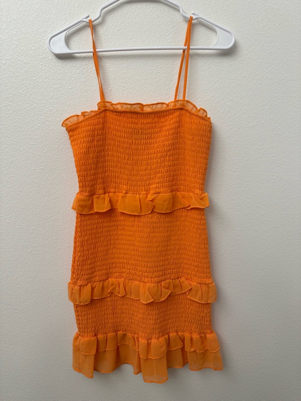 bebe Bright Orange Smocked Ruffle Top